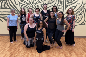 Oreet poses in front of a group of students at a North Carolina workshop.