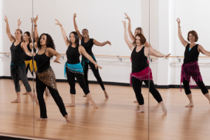 Oreet teaches a group of students a bellydance workout
