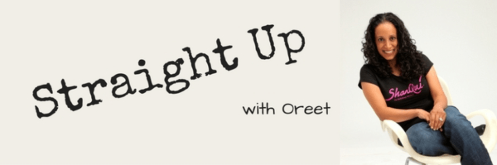 Oreet wears a black shirt with pink text that reads SharQui Workout. She sits in a chair smiling at the camera. Text reads "Straight Up with Oreet"